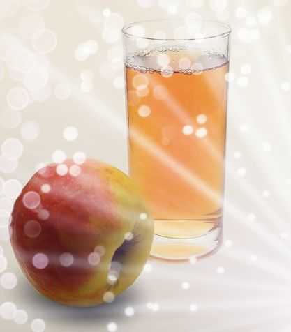 Apple and apple juice in a glass