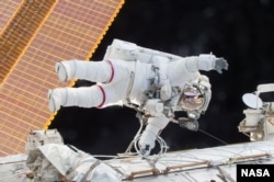 Expedition 46 Commander Scott Kelly on his third spacewalk outside the International Space Station, Dec. 21, 2015. (Courtesy NASA).