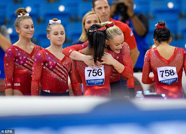 Celebration: The team won by an impressive 10-point margin, beating out Russia who took silver and China who took bronze 