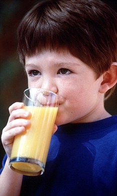 Child drinking orange