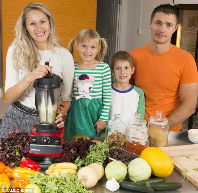 Fresh start: After two-and-a-half years on raw food, Inga and Robert Dirzuite and their children David and Kameja feel better than ever