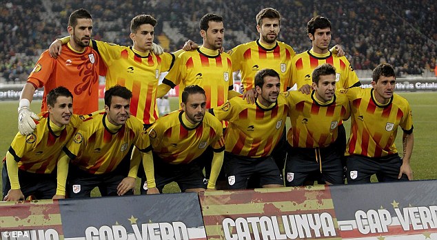First team: The Catalonia team stand together ahead of their friendly match against Cape Verde