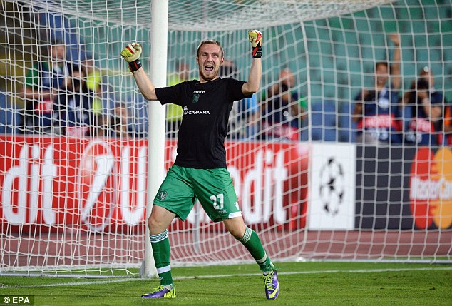 Cosmin Moti (above) celebrates his first penalty save against Steaua Bucharest in August
