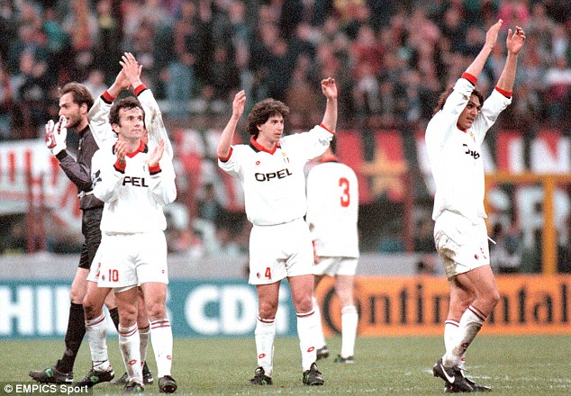 AC Milan stars applaud the home fans at the San Siro after beating PSG in the 1995-96 semi-finals