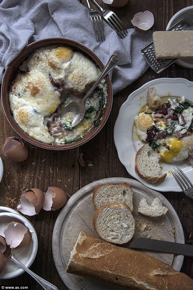 Baked pheasant eggs with baby spinach, ham, creme fraiche and grated parmesan 