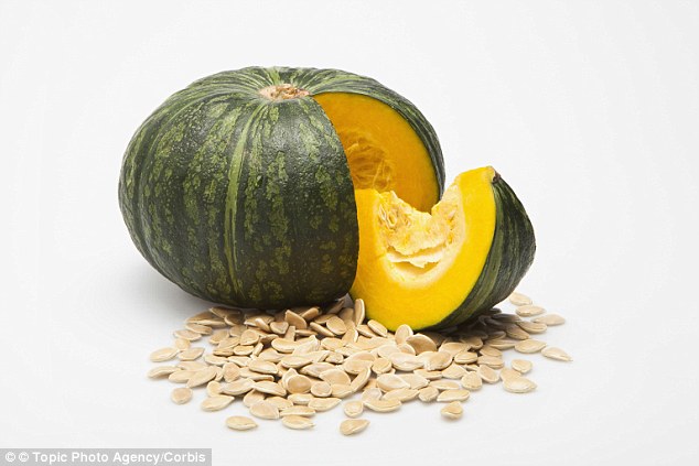 Pumpkin seeds, pictured, topped a top-ten list of mood-boosting foods compiled by dietitian Sarah Schenker and food psychologist Christy Fergusson