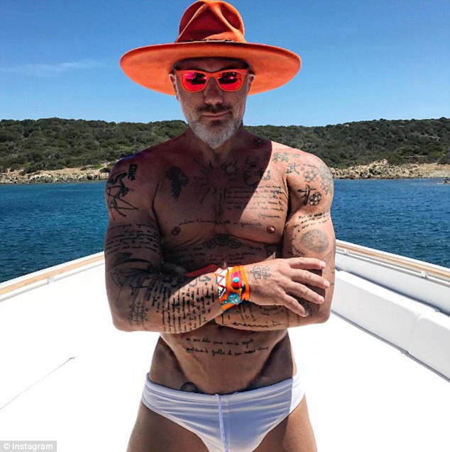 Abs to kill! Despite pushing 50, Vacchi delights his male and female fans alike with sultry topless snaps like this one of him aboard a boat which he captioned 