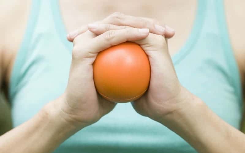 mom squeezing stress ball