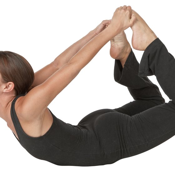 Use your abdominal muscles to lift your chest in bow pose.
