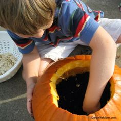 Kids Gardening Planting a Pumpkin