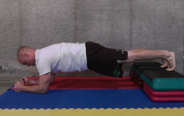 plank with feet elevated