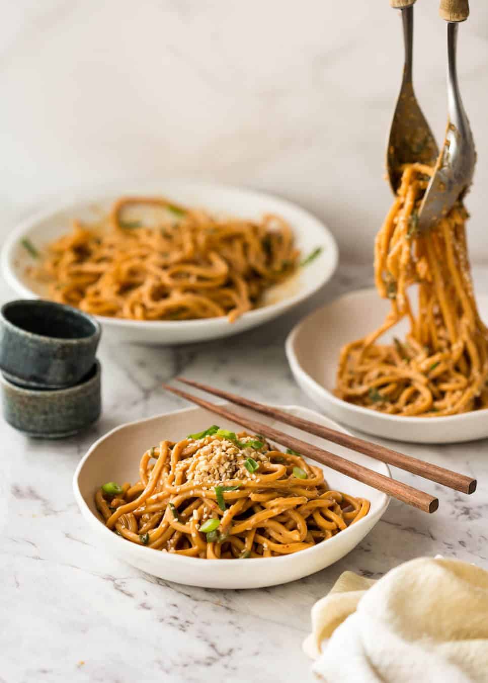 Sesame Noodles - noodles tossed with a wicked Asian Sesame Peanut Dressing. Serve these as Cold Sesame Noodles or warm. www.recipetineats.com