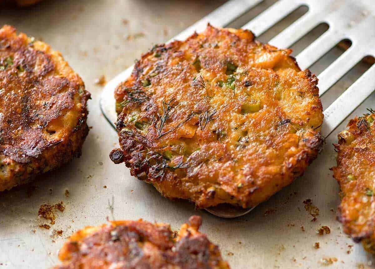 Tender insides studded with flakes of salmon, golden on the outside, these Salmon Patties are baked, not fried. Ultimate transformation of canned salmon - or use fresh! www.recipetineats.com