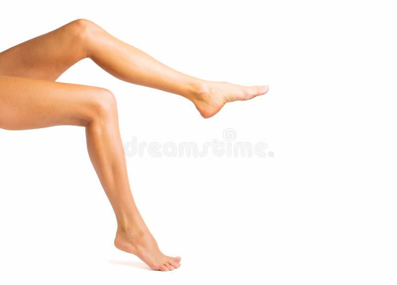 Beautiful healthy skin and perfectly waxed woman`s legs. Beautiful and perfect healthy skin and perfectly waxed woman`s legs isolated on white background stock photography