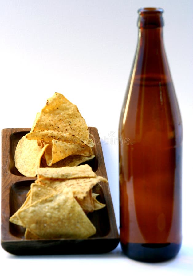 Beer Bottle with Unhealthy Eating. Beer Bottle and Unhealthy Eating isolated stock image