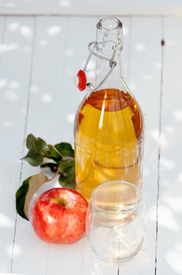 Bottle of healthy freshly squeezed apple juice royalty free stock images