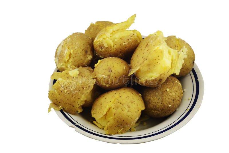 Crumbly jacket potatoes in a plate on a white stock image
