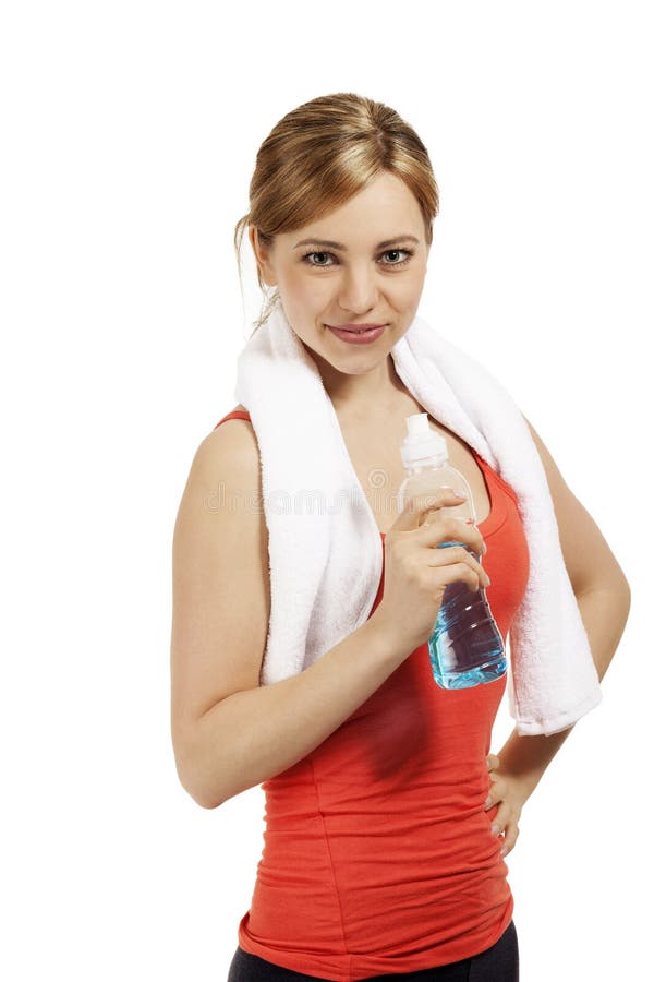 Fitness woman with a bottle of water royalty free stock image