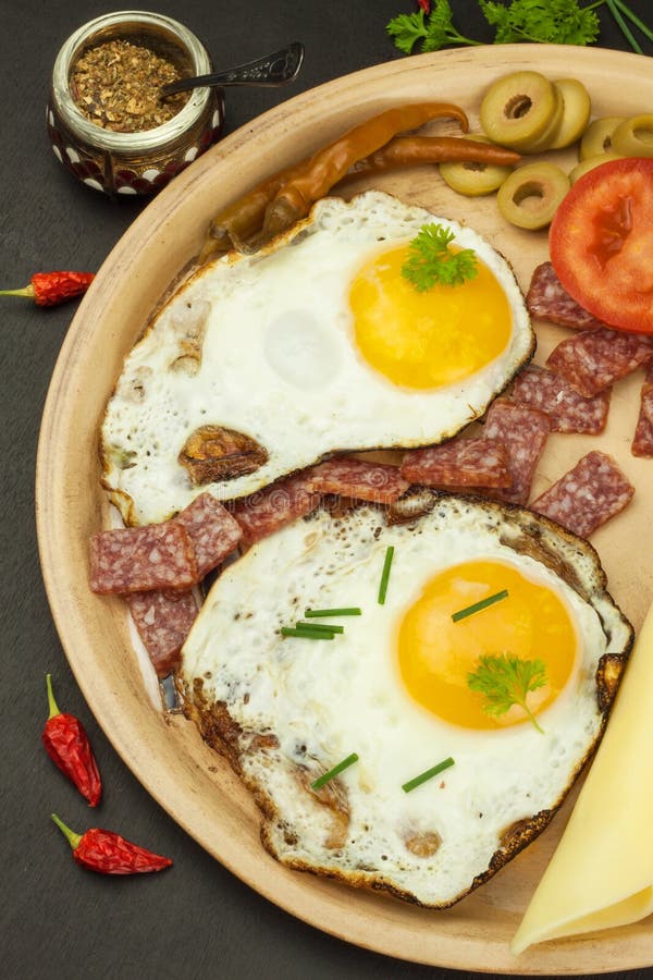 Fried Eggs on a plate. A hearty breakfast for athletes. Healthy food. Fried Eggs on a plate. A hearty breakfast for athletes. Healthy food royalty free stock photo