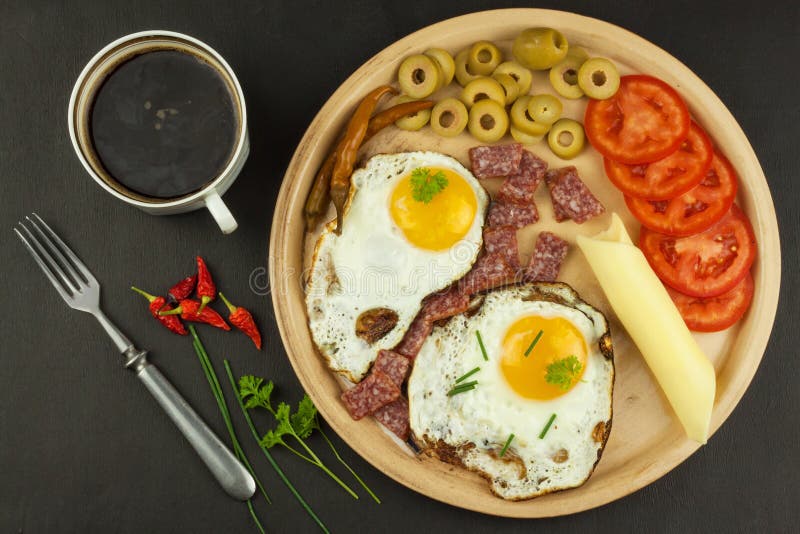 Fried Eggs on a plate. A hearty breakfast for athletes. Healthy food. Fried Eggs on a plate. A hearty breakfast for athletes. Healthy food royalty free stock photo