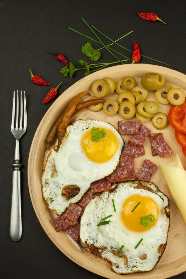 Fried Eggs on a plate. A hearty breakfast for athletes. Healthy food. Fried Eggs on a plate. A hearty breakfast for athletes. Healthy food stock photo