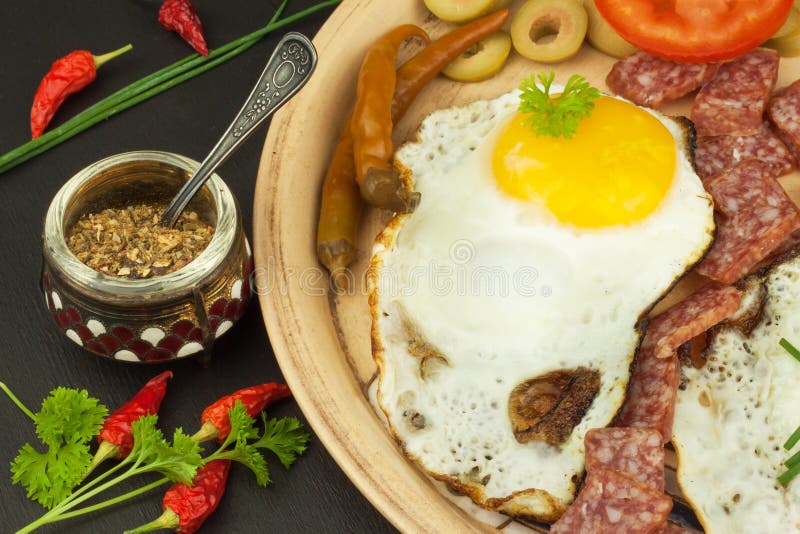 Fried Eggs on a plate. A hearty breakfast for athletes. Healthy food. Fried Eggs on a plate. A hearty breakfast for athletes. Healthy food royalty free stock photography
