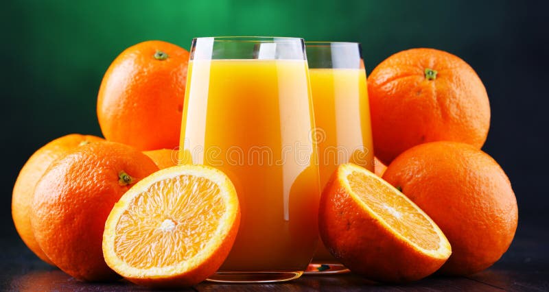 Glasses with freshly squeezed orange juice stock photo