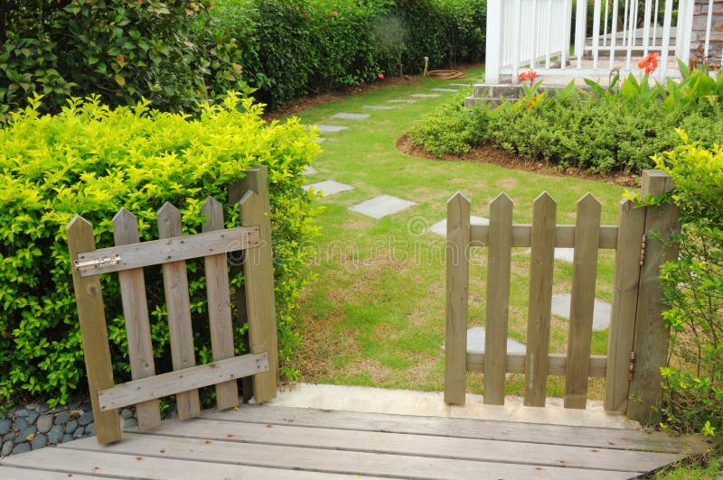 Open wooden gate and fence royalty free stock image