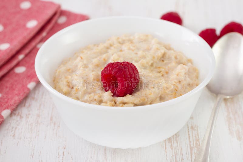 Porridge with raspberry stock photo