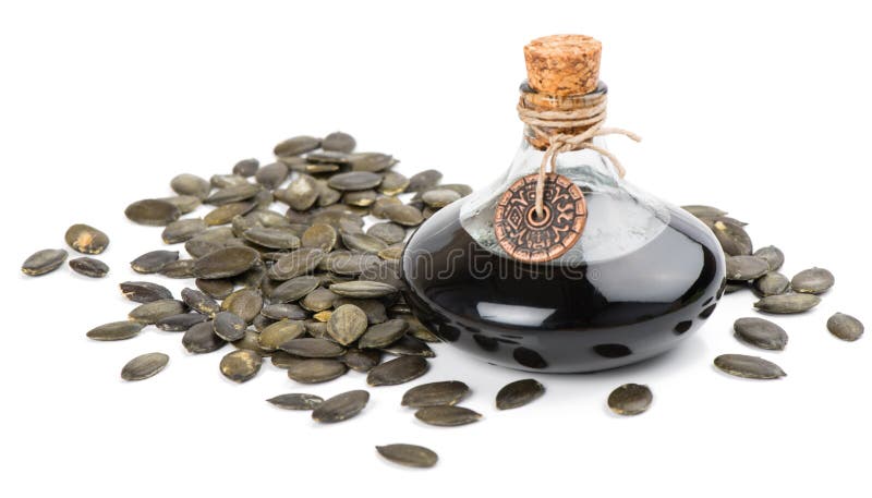 Pumpkin seeds and Pumpkin Seed Oil royalty free stock photography