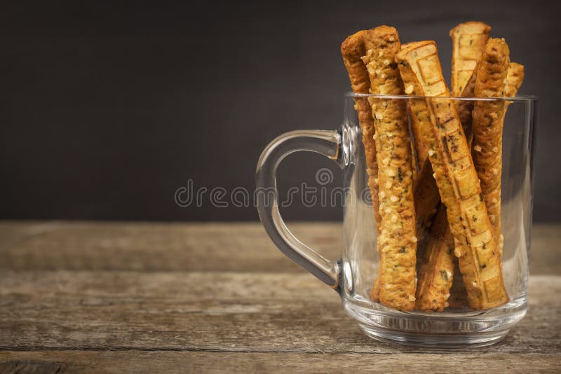 Salt sticks in a glass. Snack party. Unhealthy pastry for beer. Salt sticks in a glass. Snack party. Unhealthy pastry for beer stock photography