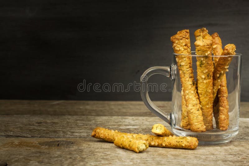 Salt sticks in a glass. Snack party. Unhealthy pastry for beer. Salt sticks in a glass. Snack party. Unhealthy pastry for beer stock photo
