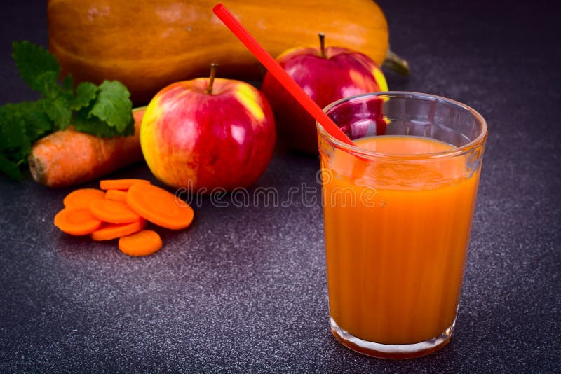 Sweet Tasty Vitamin Carrot, Pumpkin, Apple Juice. Studio Photo stock images