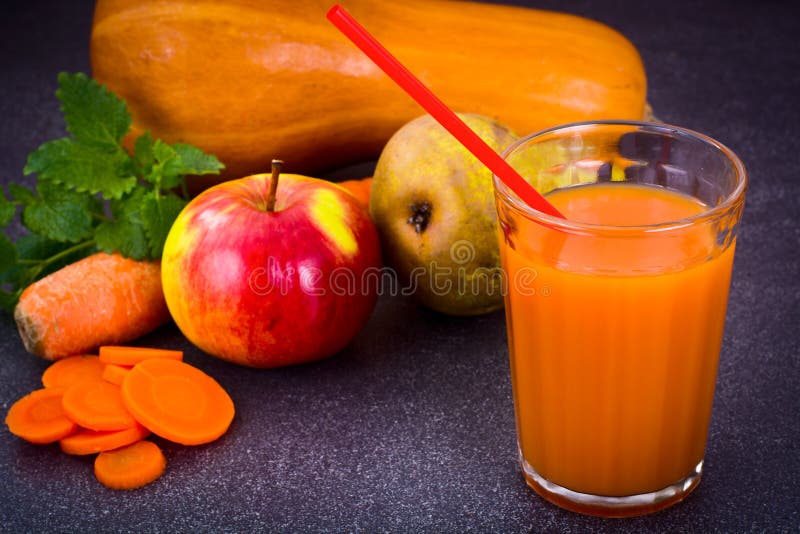 Sweet Tasty Vitamin Carrot, Pumpkin, Apple Juice. Studio Photo stock image