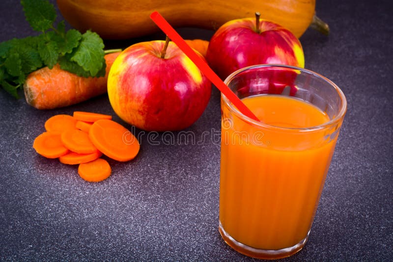 Sweet Tasty Vitamin Carrot, Pumpkin, Apple Juice. Studio Photo royalty free stock photos