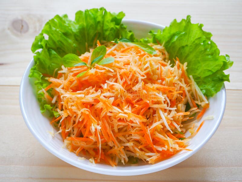 Vitamin salad with apple, carrot and celery root. Vitamin salad with apple, carrot and celery root stock photo