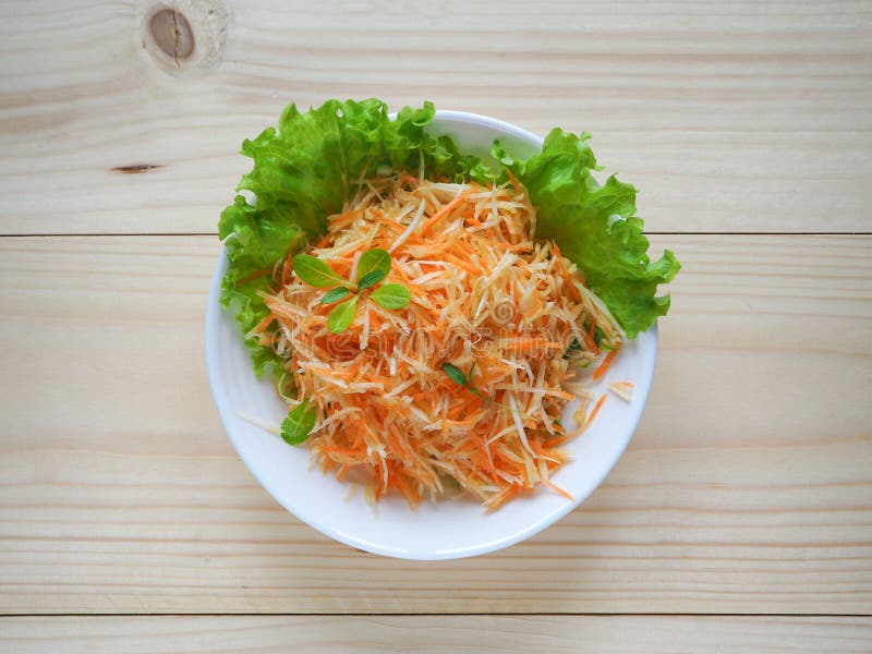 Vitamin salad with apple, carrot and celery root. Vitamin salad with apple, carrot and celery root royalty free stock images