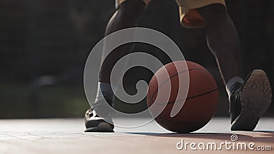 Bottom Camera View of Afro American Guy Running to the Ball lying on the Ground and Take it Outside at the Urban Sports stock footage