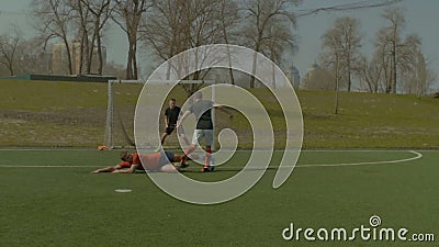 Soccer defense player making sliding tackle stock video