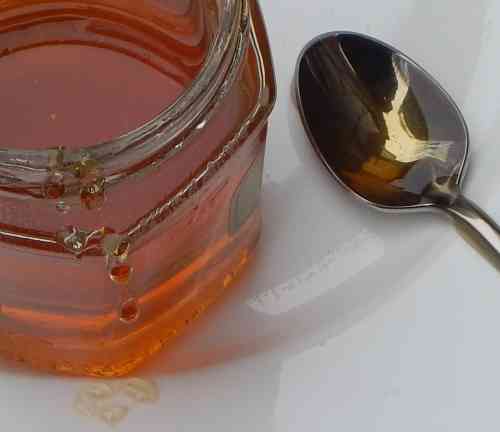 Soft set honey and spoon.