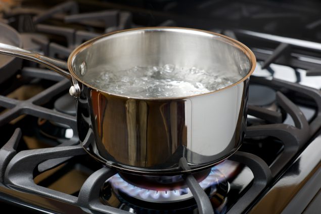 Water Boiling on a Gas Stove, stainless pot.