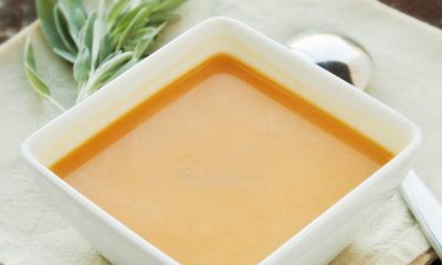 Bowl of vegetarian butternut squash soup with fresh sage